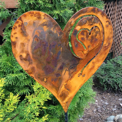 A Rusted Heart Stake in the Garden