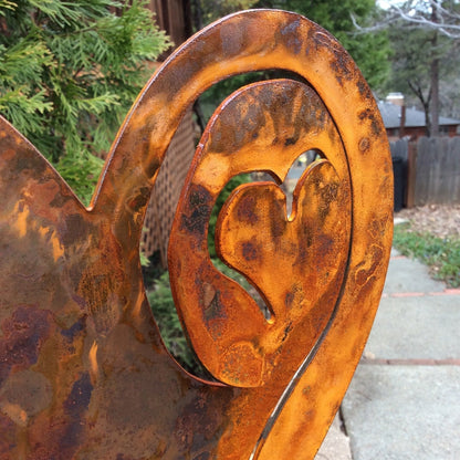 A Rusted Heart Stake in the Garden