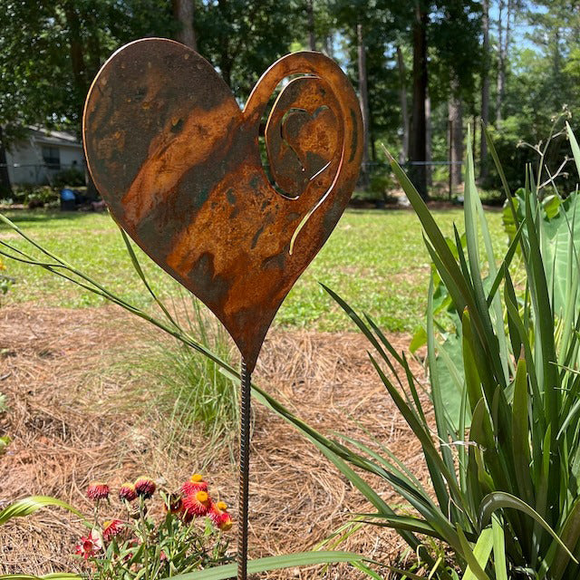 A Rusted Heart Stake in the Garden